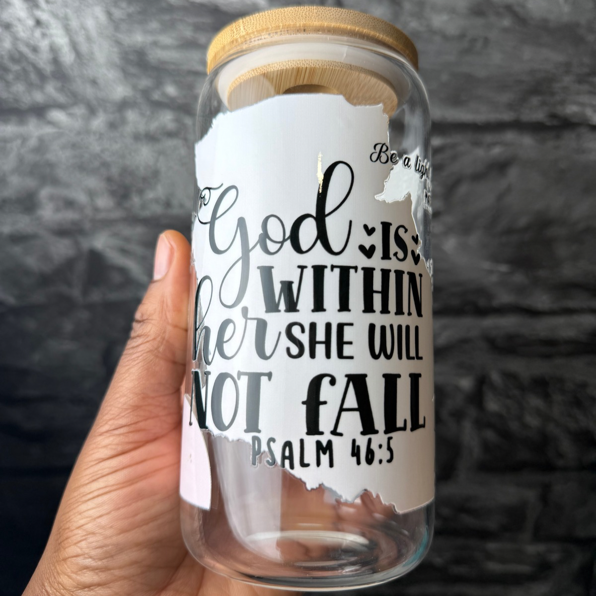 Gos is within her 16 oz. Glass cup